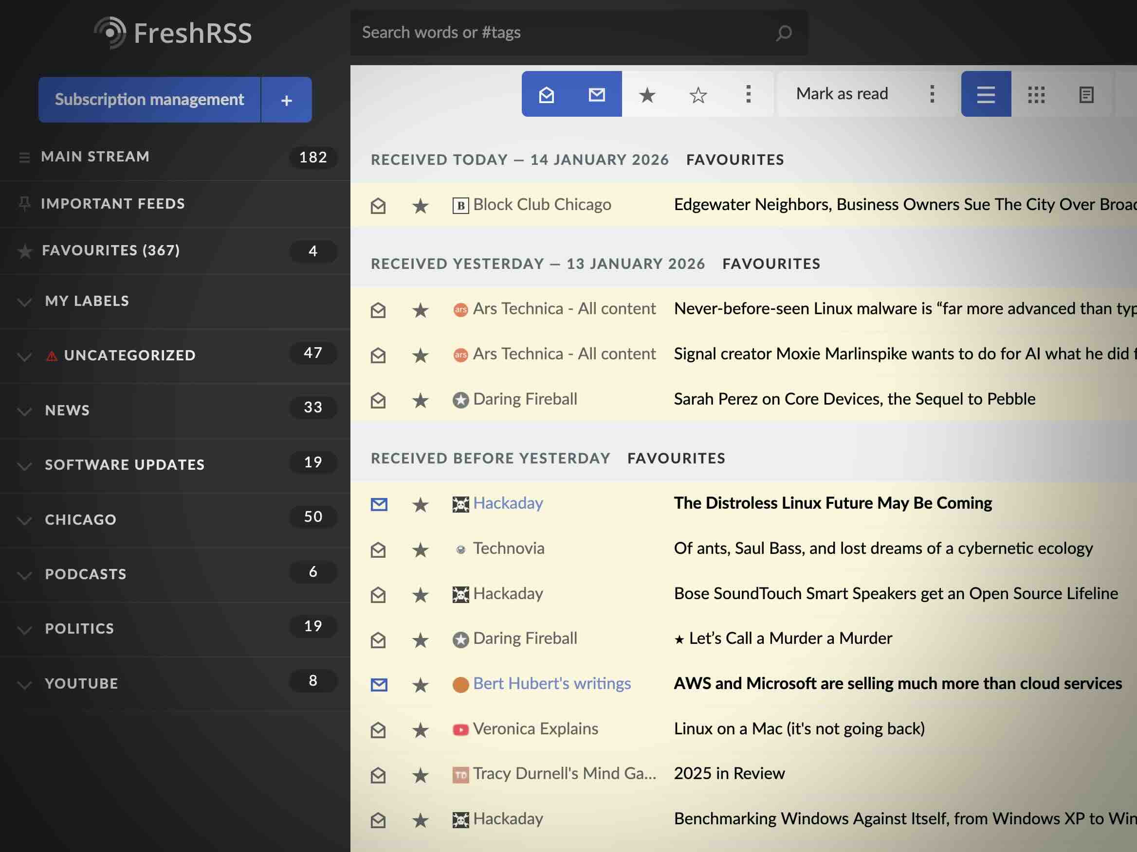 A screenshot of the web application FreshRSS showing categories on the left-hand column and a list of starred articles on the right-hand column.