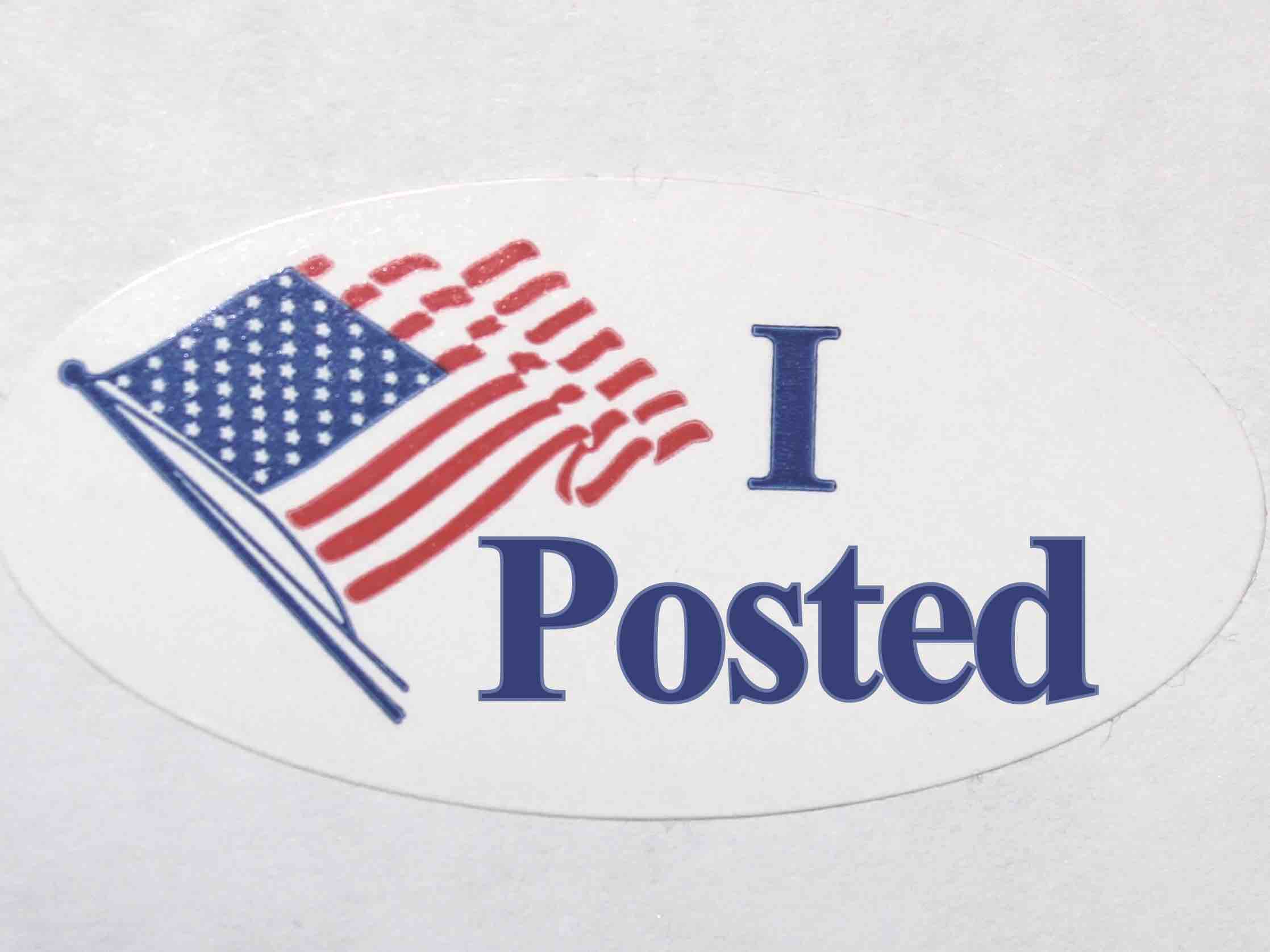 A sticker with a U.S. flag that says 'I Posted' instead of saying 'I Voted'.