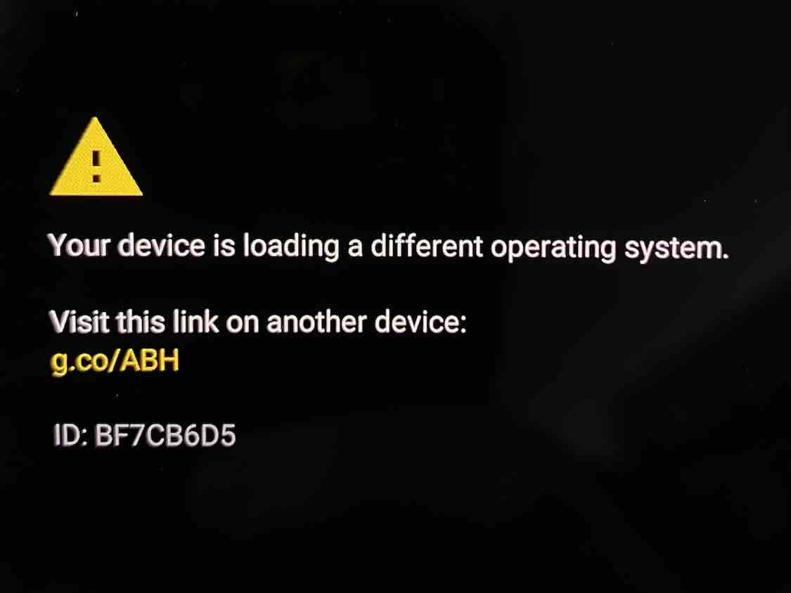 A photo of a warning from the Android bootloader running a custom ROM. It says 